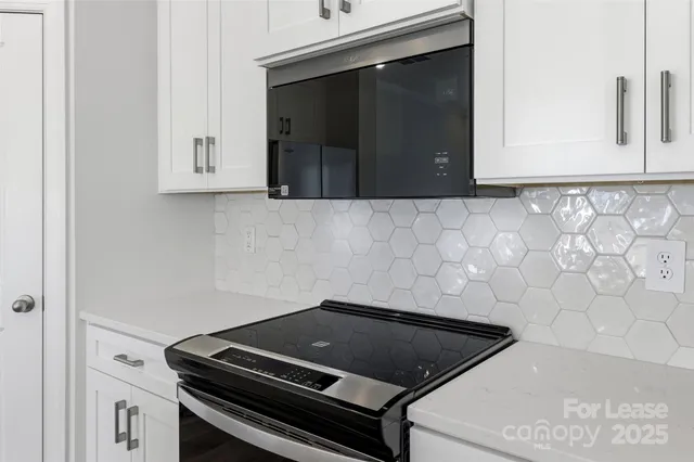 a close view of a stove in the kitchen