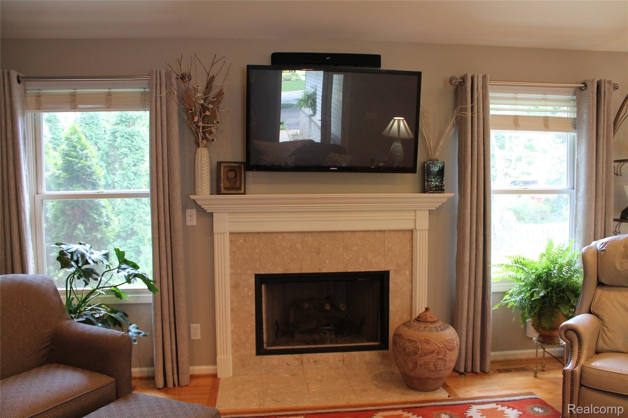 2670 East Wardlow Road Highland, MI 48356 - Photo 12 of 99 Gas fireplace in great room