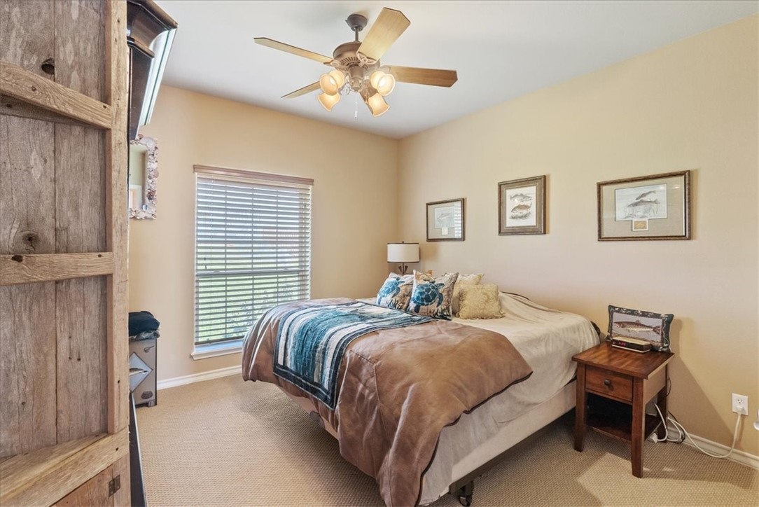 9129 County Road 2226 Taft, TX 78390 - Photo 13 of 40 front bedroom with builtin shelving