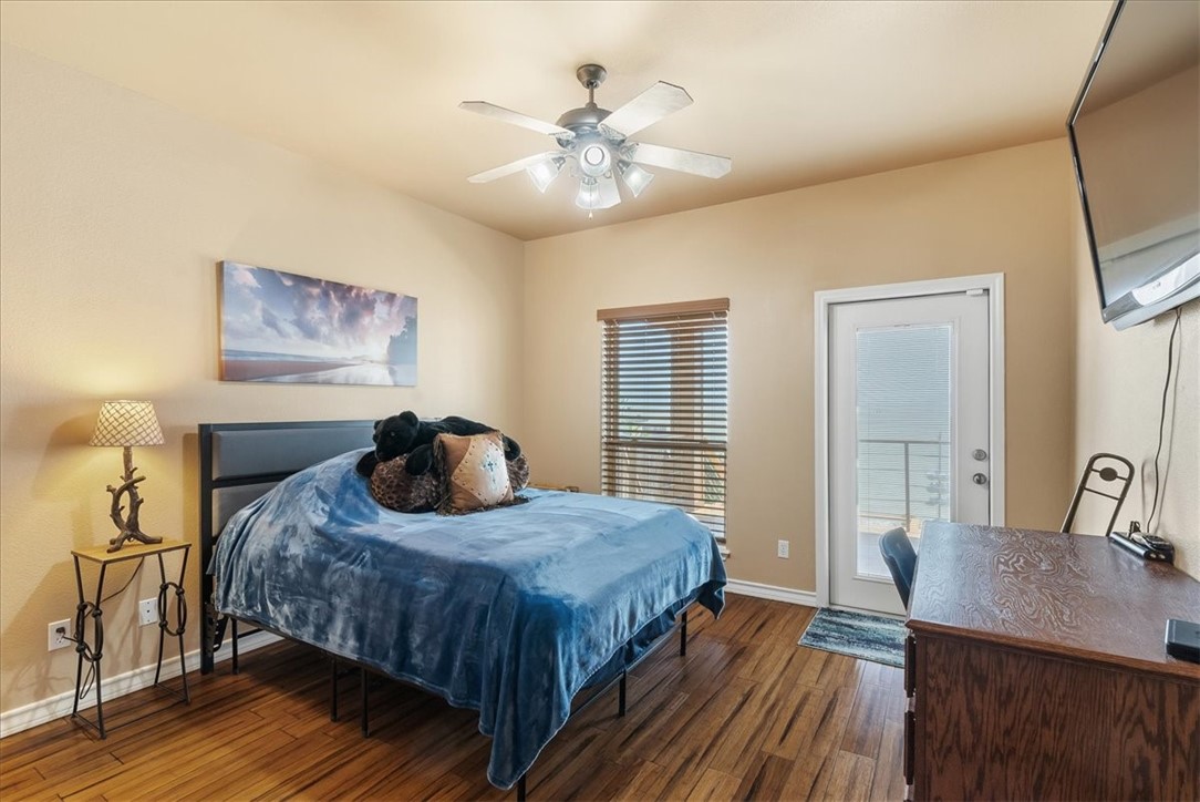9129 County Road 2226 Taft, TX 78390 - Photo 15 of 40 back bedroom with water view deck access