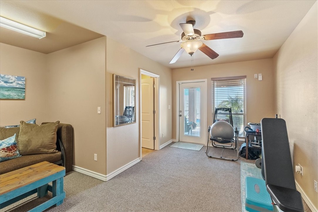 9129 County Road 2226 Taft, TX 78390 - Photo 17 of 40 Lower Level Guest room with water view patio acces