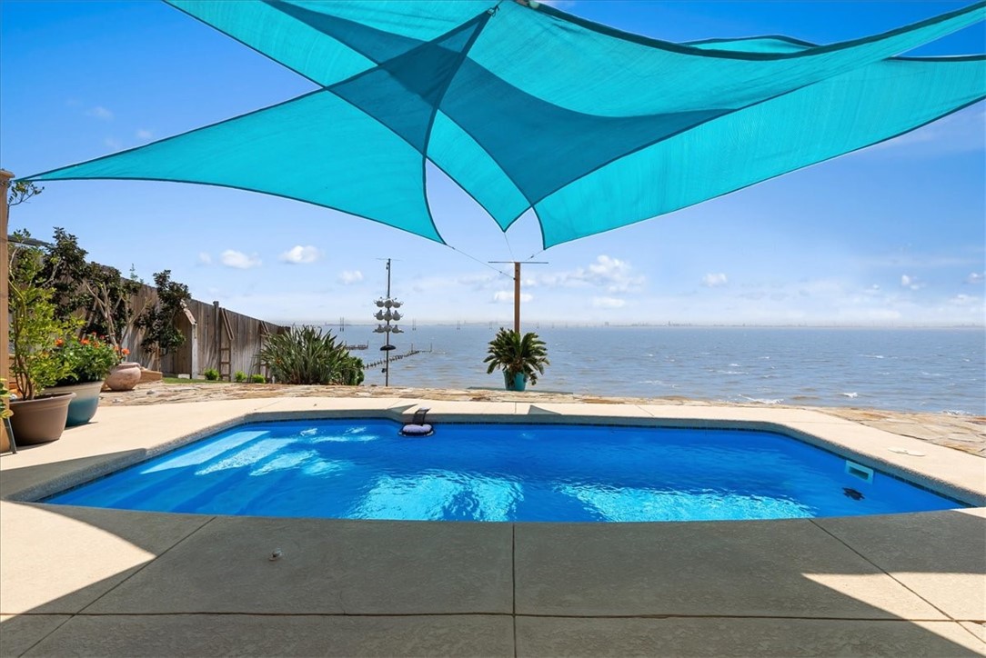 9129 County Road 2226 Taft, TX 78390 - Photo 24 of 40 Pool with a beautiful water view