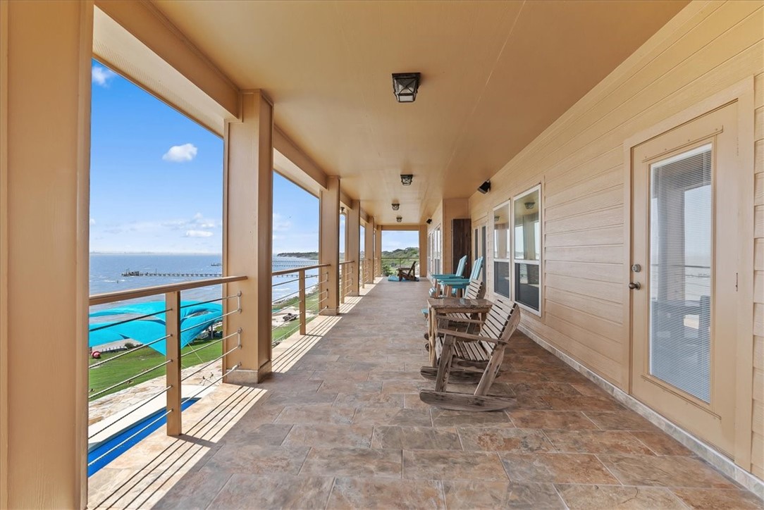 9129 County Road 2226 Taft, TX 78390 - Photo 26 of 40 Upper level covered patio with water views