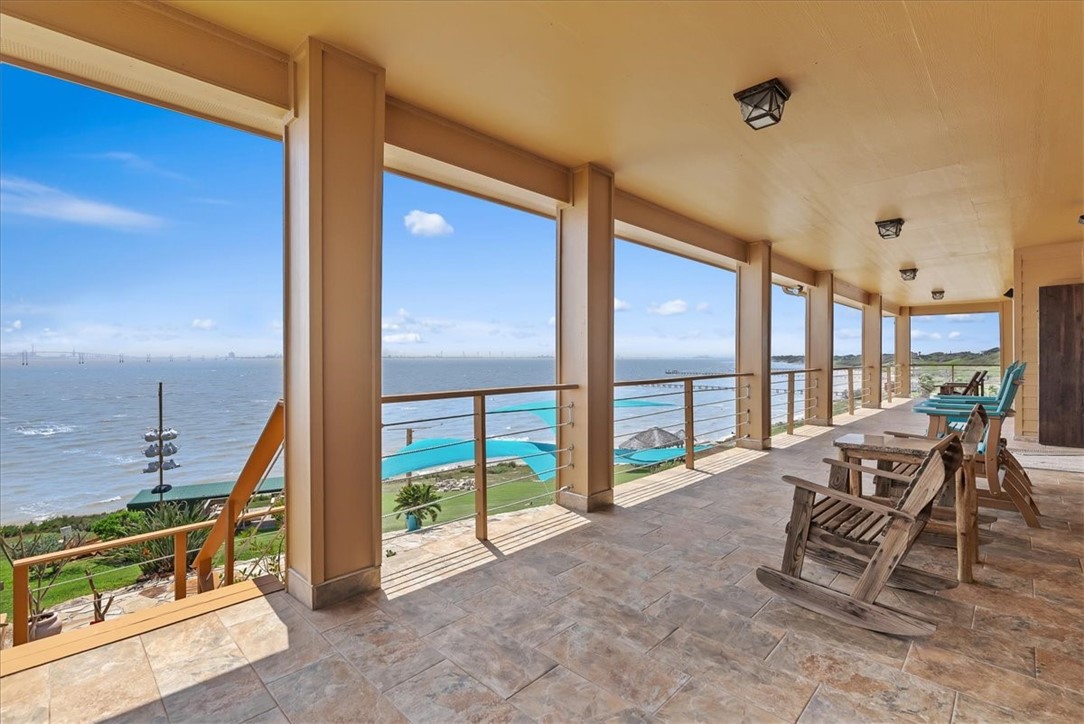 9129 County Road 2226 Taft, TX 78390 - Photo 27 of 40 Upper level covered patio with water views