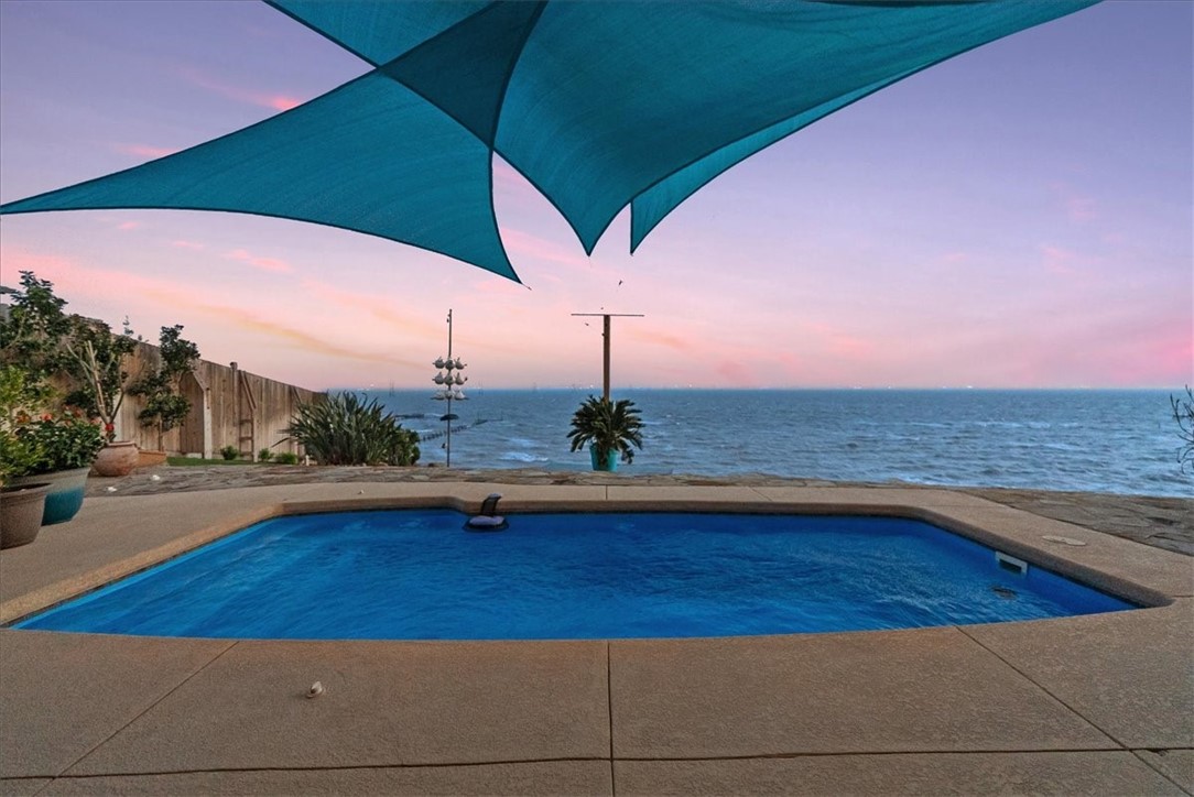 9129 County Road 2226 Taft, TX 78390 - Photo 36 of 40 Sunset view from lower level covered patio
