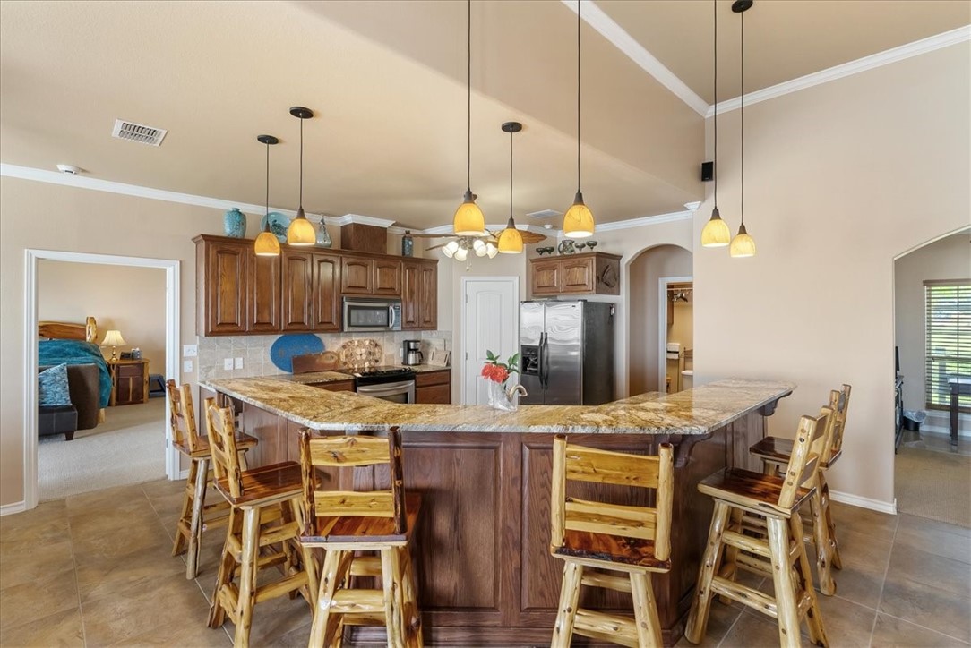 9129 County Road 2226 Taft, TX 78390 - Photo 5 of 40 expansive breakfast bar open to dining and living