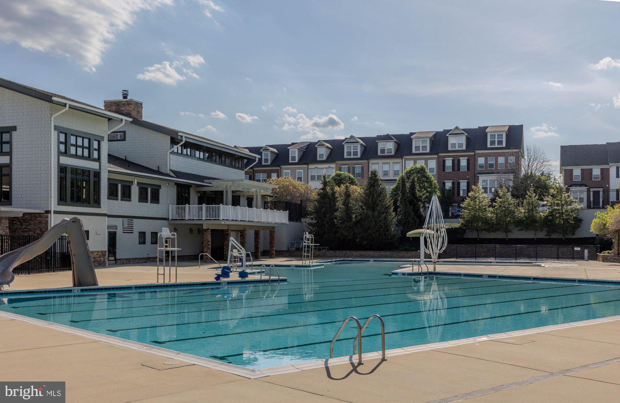 12824 Clarksburg Square Road, Unit 105 Clarksburg, MD 20871 - Photo 3 of 96 Sunny oasis with a sparkling pool.