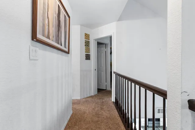 a view of a hallway with entryway