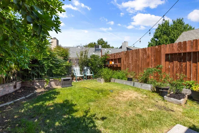 a view of a backyard with a garden