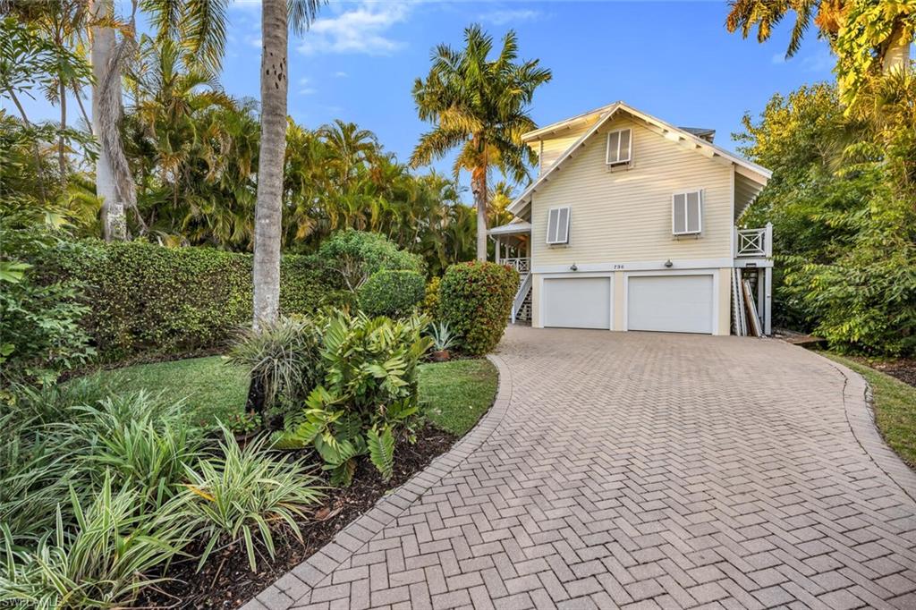 756 8th Avenue South Naples, FL 34102 - Photo 24 of 28 Rear driveway and yard off paved ally