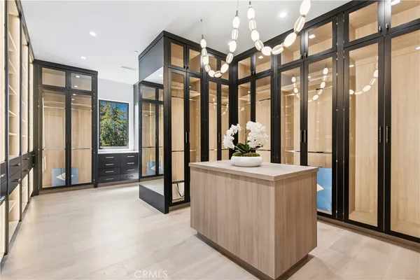 a view of living room kitchen and windows