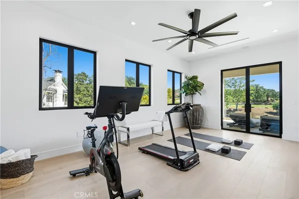 a work room with furniture and windows