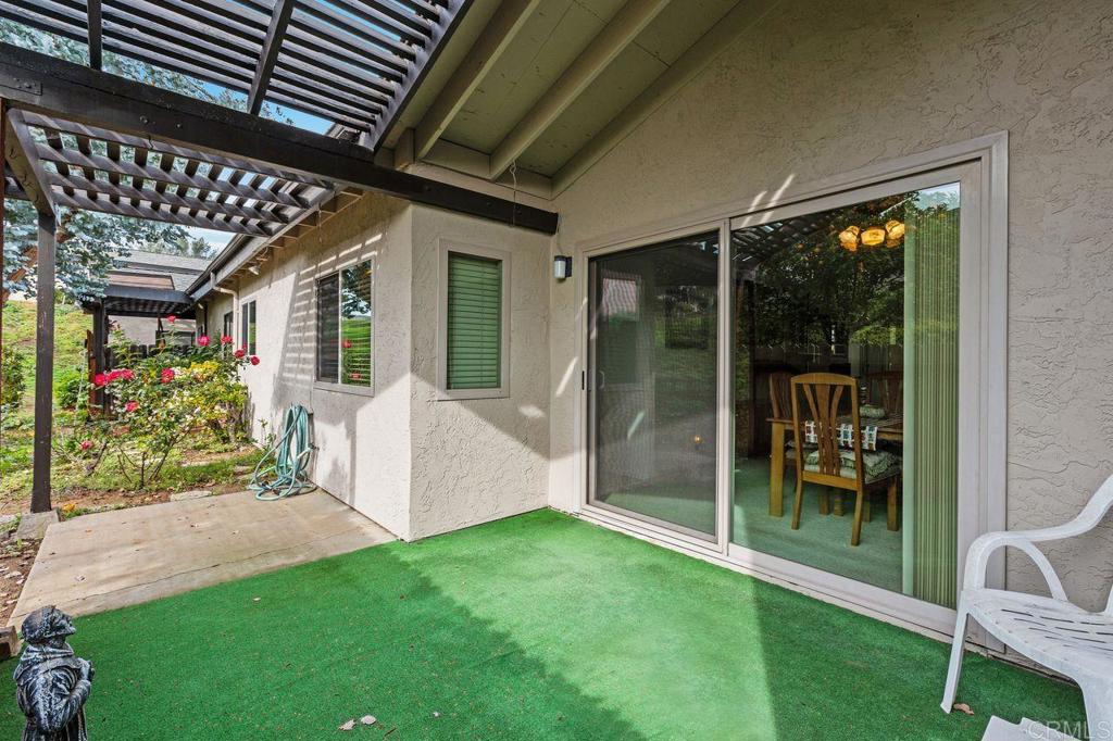 727 Nob Circle Vista, CA 92084 - Photo 17 of 39 a view of a porch with chairs and backyard