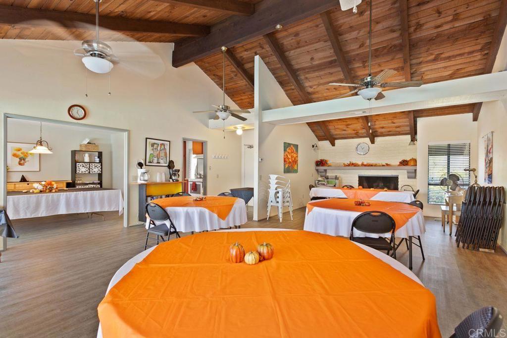 727 Nob Circle Vista, CA 92084 - Photo 36 of 39 a view of a dining room with furniture and wooden floor
