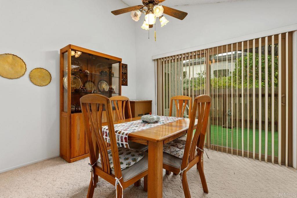 727 Nob Circle Vista, CA 92084 - Photo 8 of 39 a view of a dining room with furniture and chandelier