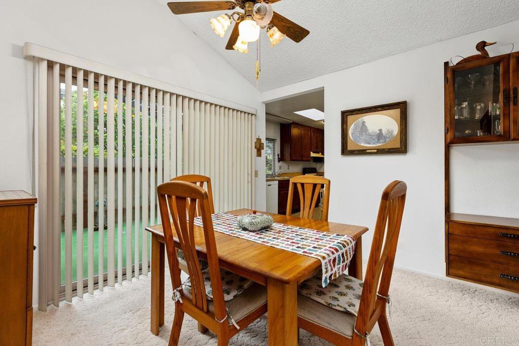 727 Nob Circle Vista, CA 92084 - Photo 10 of 39 a view of a dining room with furniture and wooden floor