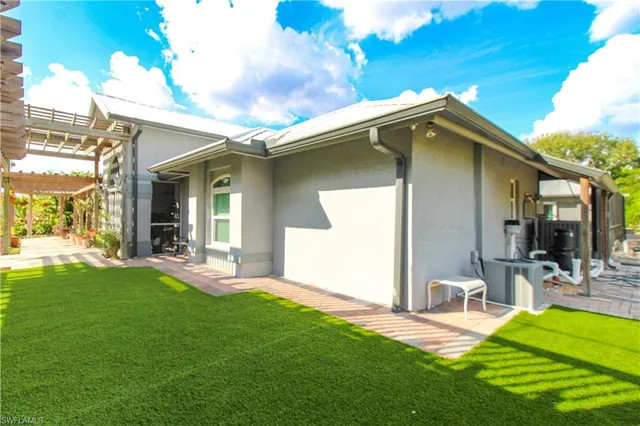 a view of a house with a swimming pool