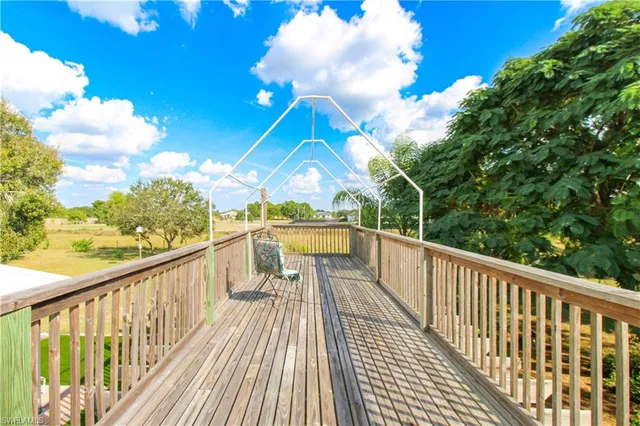 a view of a porch with a bench in patio