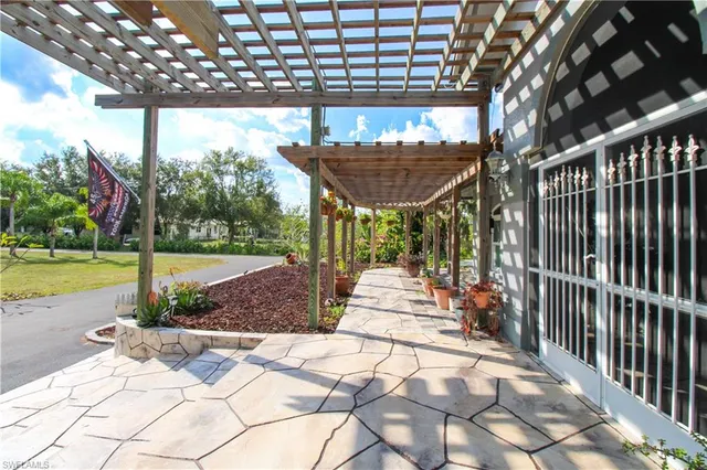 a view of a chairs and table in a patio