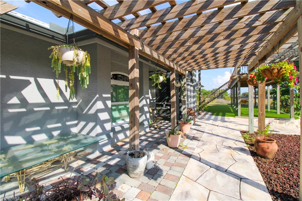 3935 70th Avenue Northeast Naples, FL 34120 - Photo 25 of 50 a view of porch with seating space