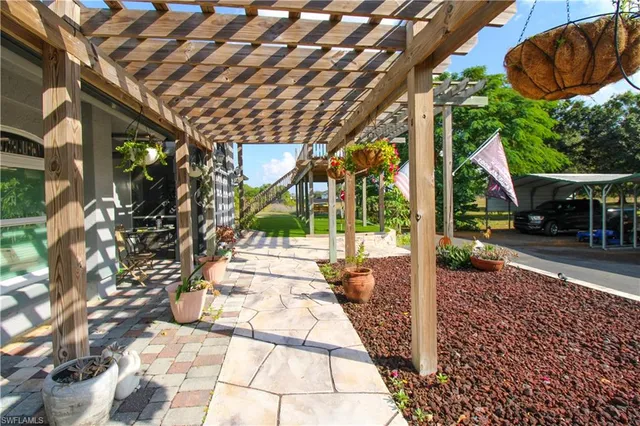 a view of a swimming pool with a patio