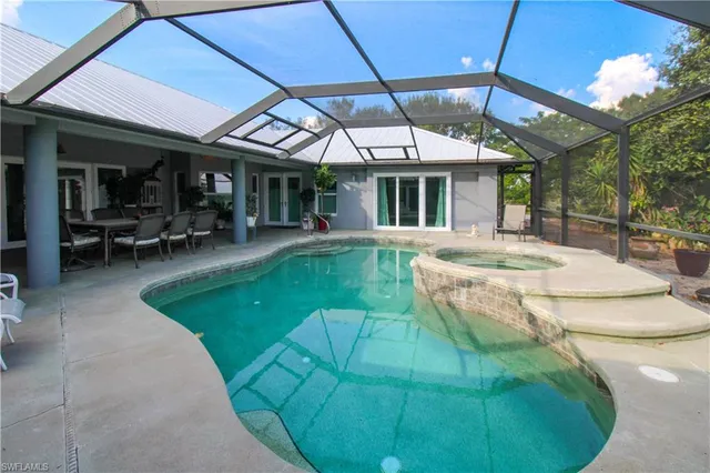 a view of a house with backyard porch and patio