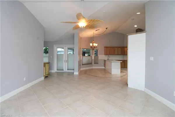 a view of room with furniture and a flat screen tv
