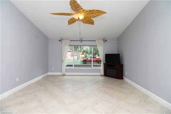a kitchen with stainless steel appliances a stove refrigerator sink and cabinets