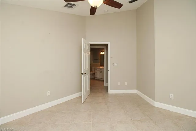a bathroom with a mirror and a sink