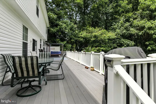 a view of balcony with furniture