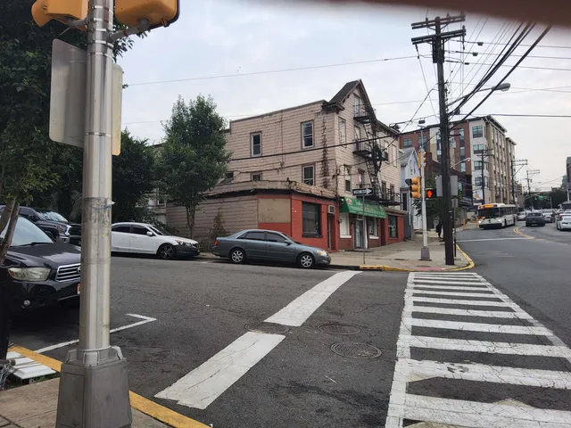 a view of a street with cars