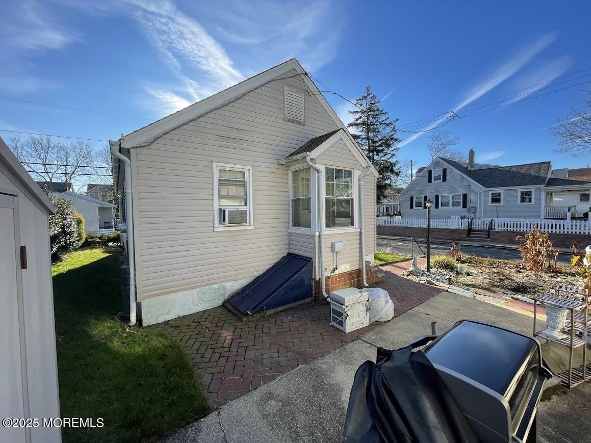 137 Inskip Avenue Ocean Grove, NJ 07756 - Photo 11 of 11 a view of a chairs and table in backyard