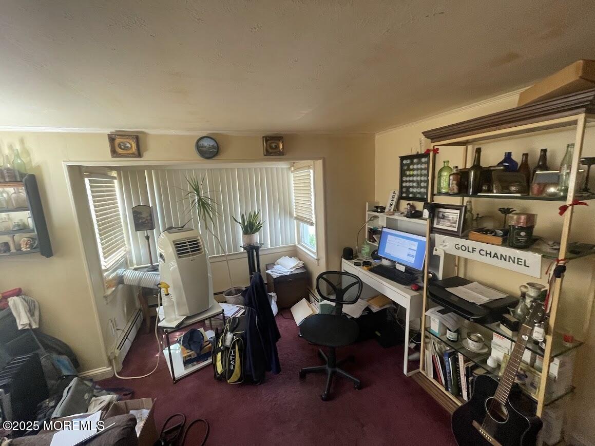 137 Inskip Avenue Ocean Grove, NJ 07756 - Photo 8 of 11 a view of a workspace with furniture and a window