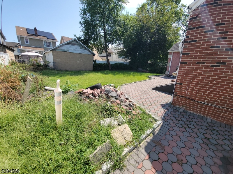 20 Greene Terrace Irvington, NJ 07111 - Photo 15 of 21 a view of a house with a yard
