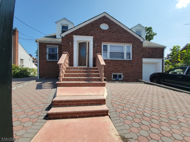 20 Greene Terrace Irvington, NJ 07111 - Photo 17 of 21 a front view of a house with a yard