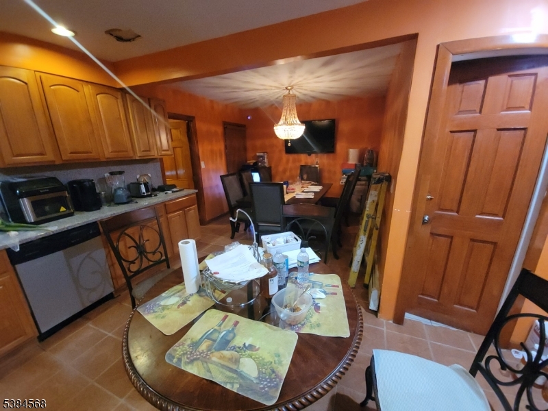 20 Greene Terrace Irvington, NJ 07111 - Photo 2 of 21 a view of a dining room with furniture window and wooden floor
