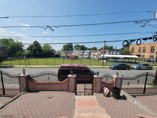 a view of a chairs and tables in the patio