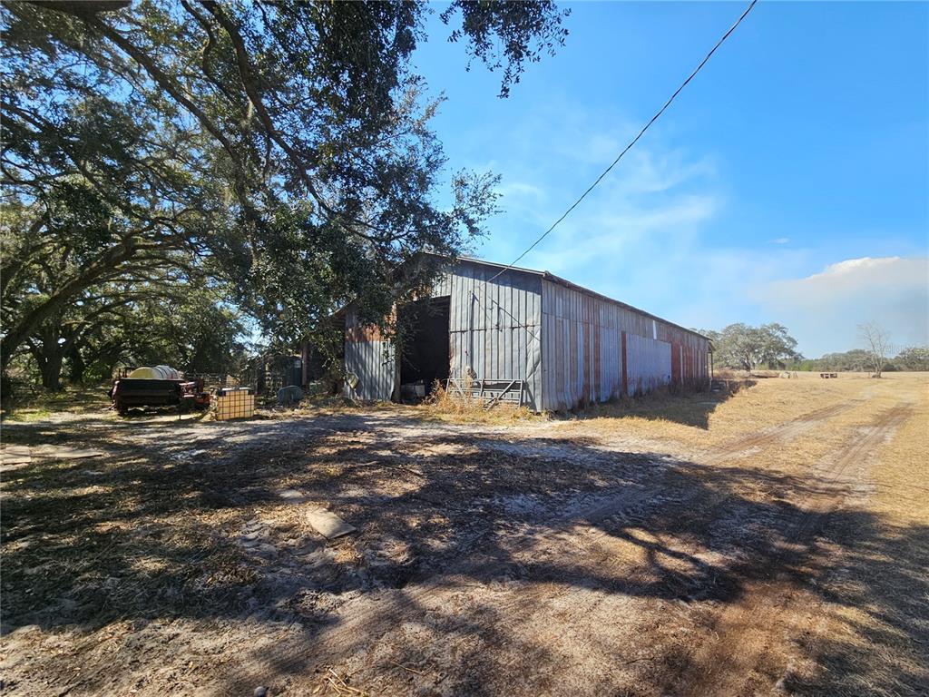 13308 Duck Lake Canal Road Dade City, FL 33525 - Photo 31 of 90 a view of a backyard of the house
