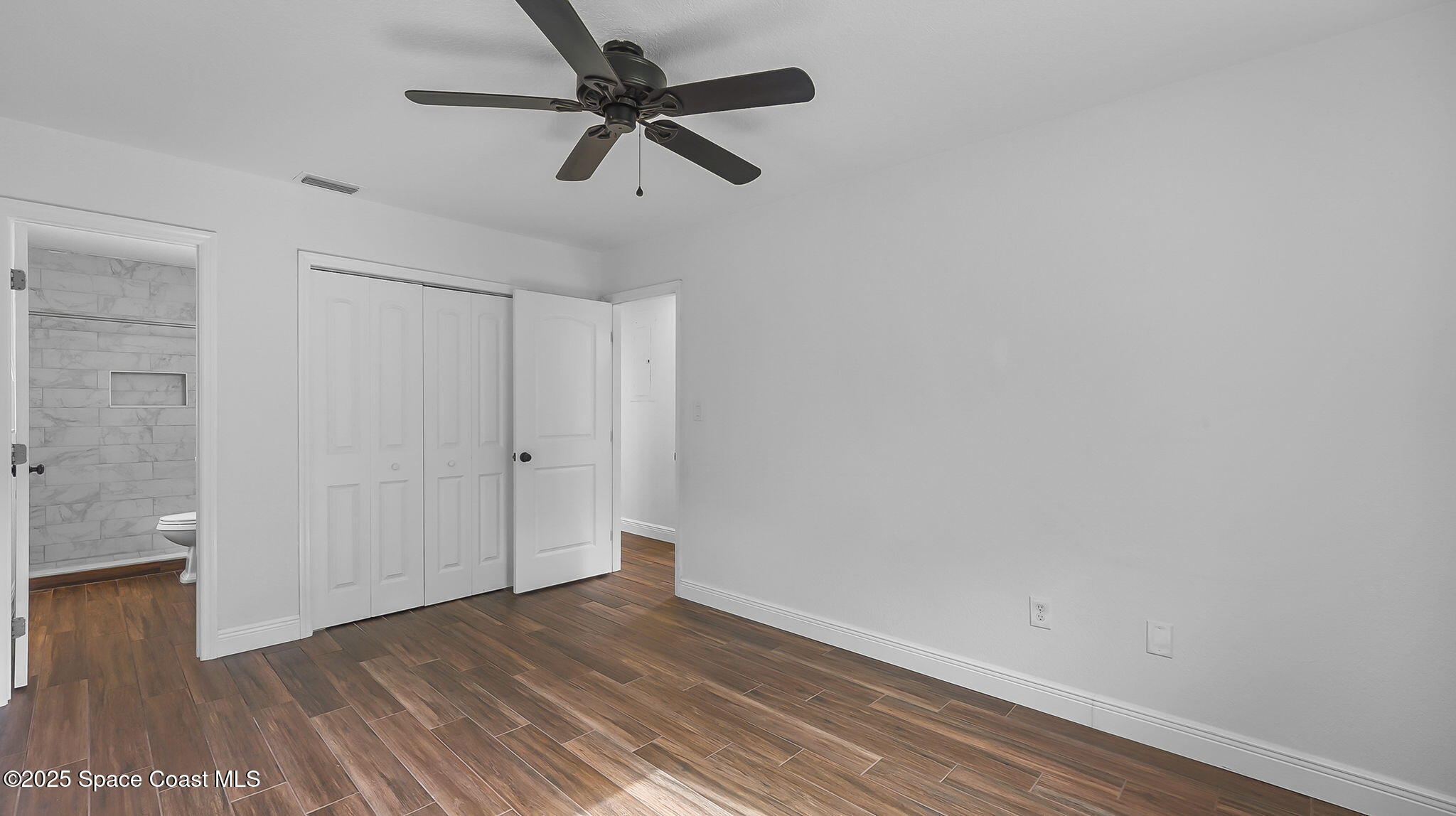985 Hall Road Malabar, FL 32950 - Photo 23 of 39 wooden floor in an empty room