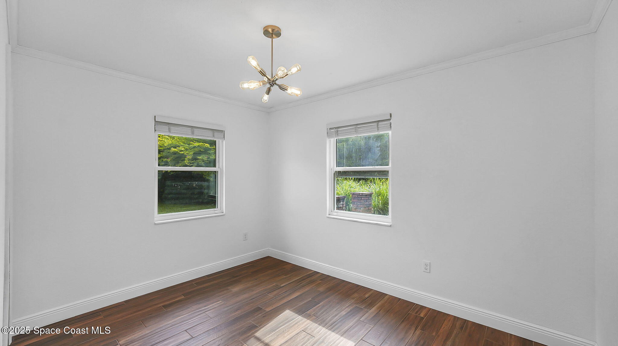 985 Hall Road Malabar, FL 32950 - Photo 26 of 39 an empty room with a window