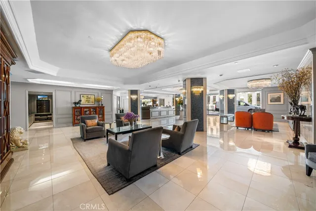 a view of a livingroom with furniture and a flat screen tv