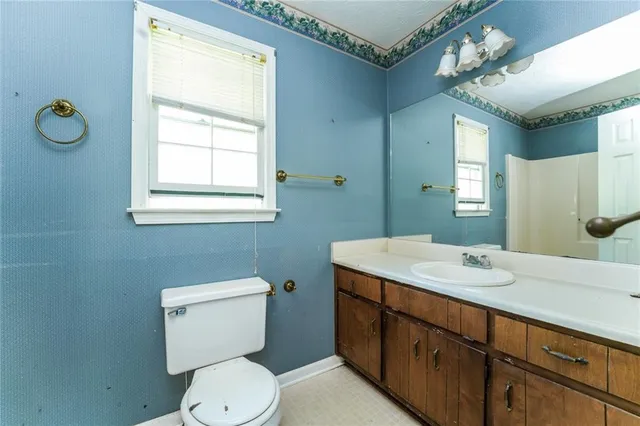 a view of porch with green trees in front