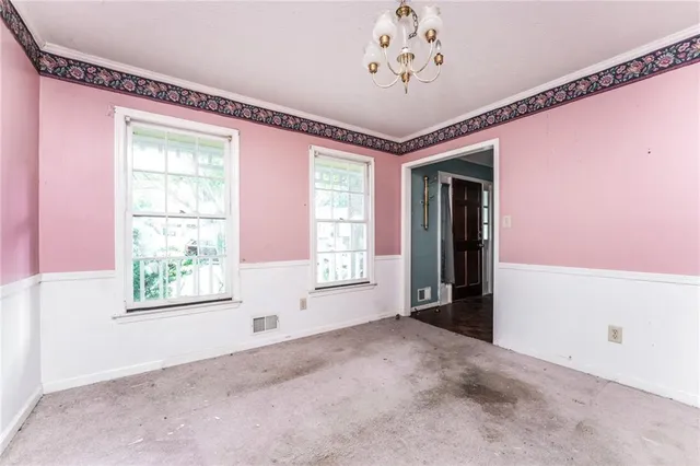 a large white room with a large window