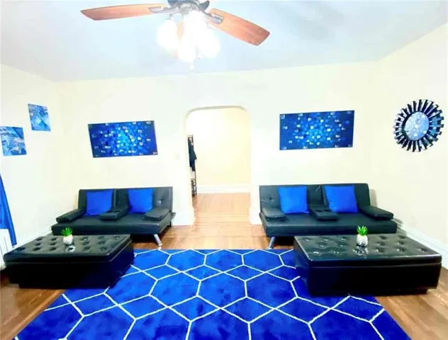 a living room with a couch and a table