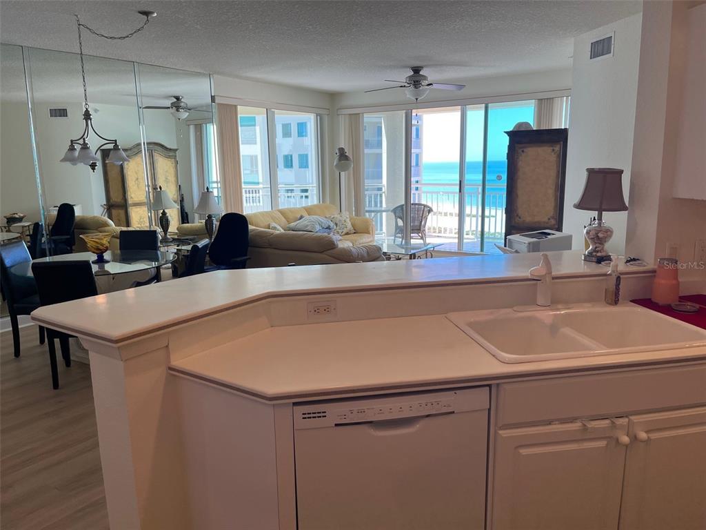 1170 Gulf Boulevard, Unit 1203 Clearwater Beach, FL 33767 - Photo 16 of 34 a room with sink and mirror