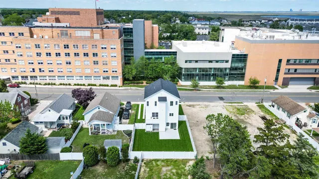 a view of backyard with swimming pool