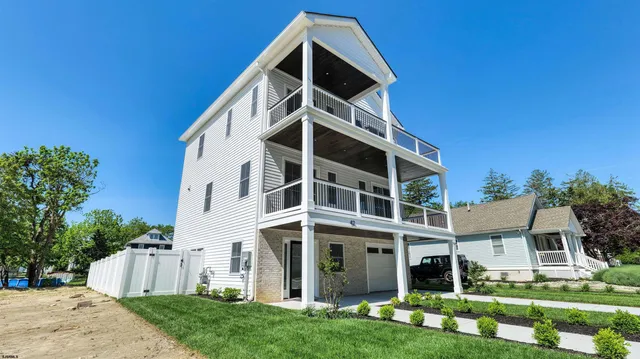 a backyard of a house with seating space