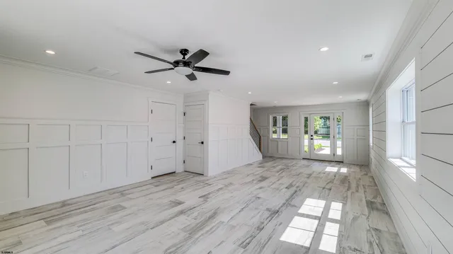a bathroom with a glass shower door