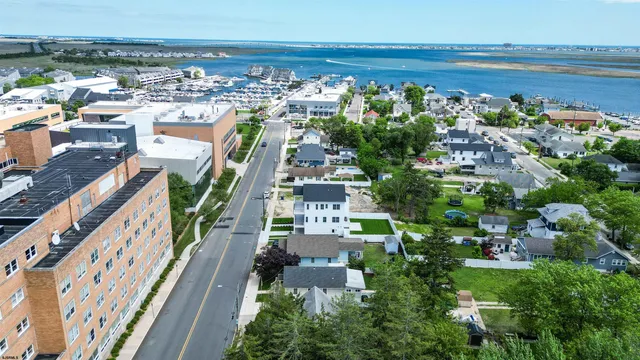 a aerial view of a house with a yard