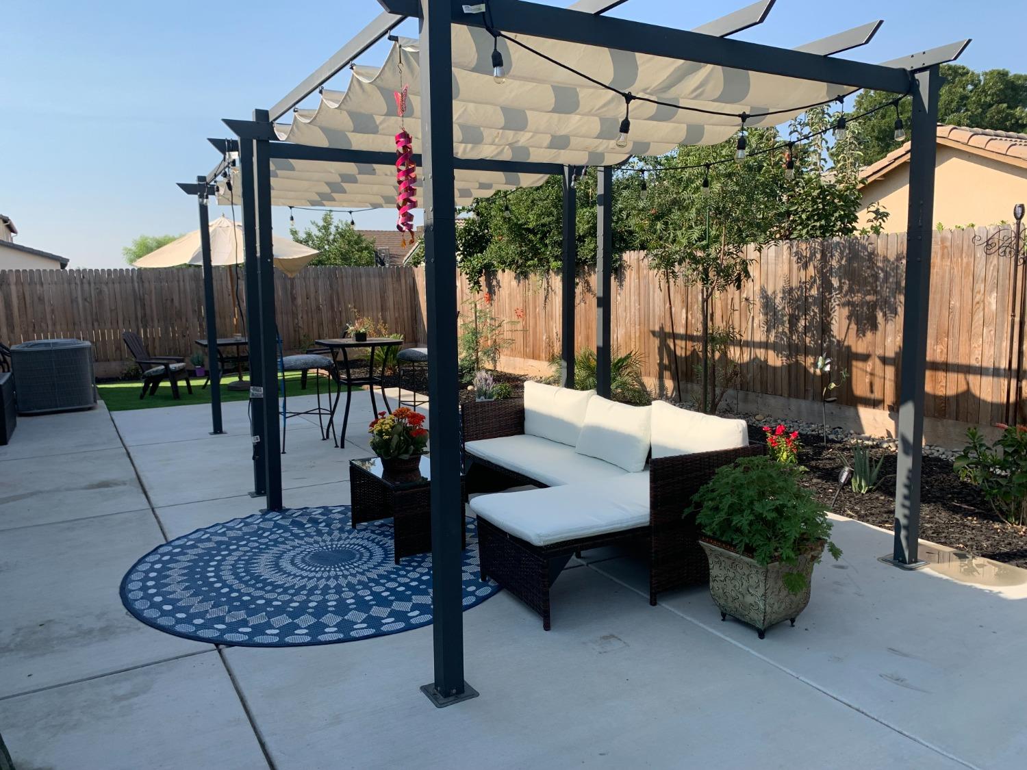 356 Solano Street Madera, CA 93638 - Photo 14 of 15 a patio outdoor space with furniture
